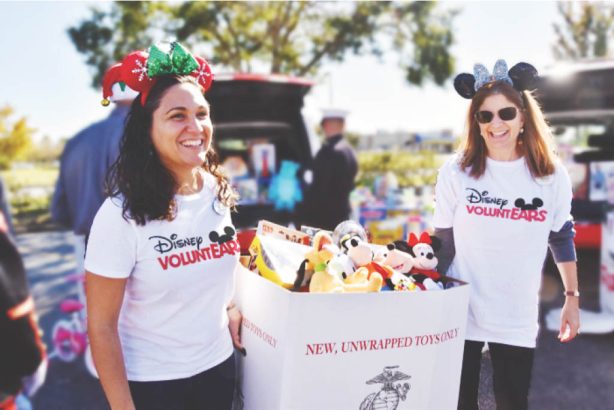 https://thewaltdisneycompany.com/app/uploads/2022/11/Disney-VoluntEARS-Ultimate-Toy-Drive-614x410.jpg