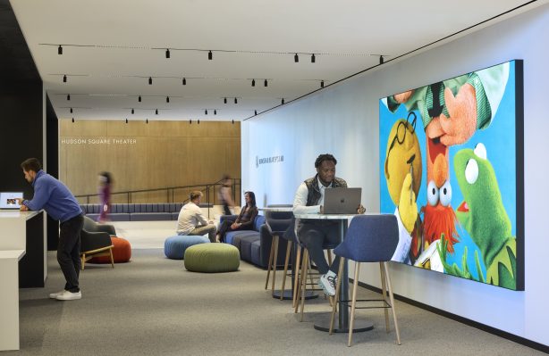 Employees sitting at Bunsen & Beaker’s lab in Disney’s New York Headquarters by Dave Burk – SOM © 2024 Disney